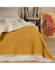 Kuscheldecke aus Wolle in MISTED YELLOW